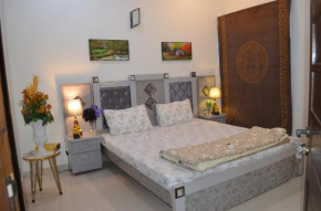 Holidazzle Residences DHA Karachi